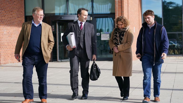 Hannah Ingram-Moore, the daughter of the late Captain Sir Tom Moore, with husband Colin (left) and son Benjie (right), at Central Bedfordshire Council in Chicksands, Bedfordshire, for a hearing to appeal against an order to demolish an unauthorised spa pool block built at her home. Picture date: Tuesday October 17, 2023.