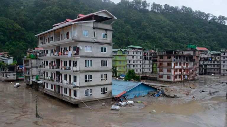Buildings are inundated after flash floods triggered by a sudden heavy rainfall swamped the Rangpo town in Sikkim, India, Thursday, Oct.5. 2023. The flooding took place along the Teesta River in the Lachen Valley of the north-eastern state, and was worsened when parts of a dam were washed away. (AP Photo/Prakash Adhikari)