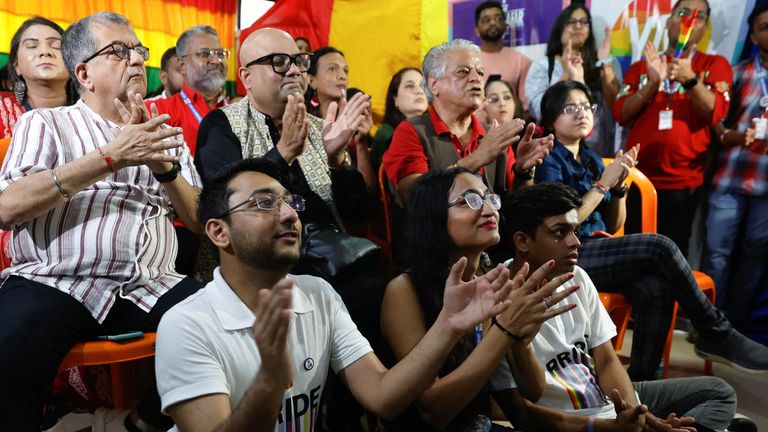 Members of the lesbian, gay, bisexual and transgender community (LGBT community) watch the judgement on same-sex marriage by the Supreme Court on a screen at an office in Mumbai, India October 17, 2023. REUTERS/Francis Mascarenhas
