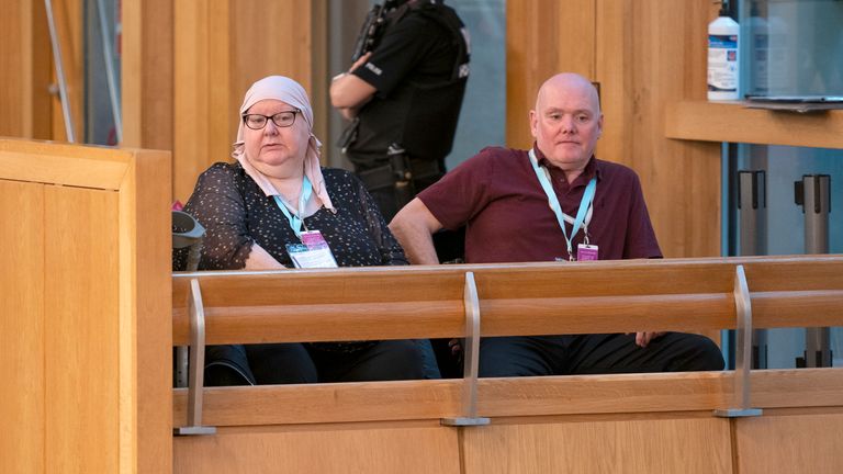 Fiona and Ian Inglis, parents of the late Claire Inglis who was murdered by her abusive boyfriend Christopher McGowan at her home in Stirling in November 2021, sit in the public gallery during First Minster&#39;s Questions (FMQ&#39;s) at the Scottish Parliament in Holyrood, Edinburgh. Picture date: Thursday October 26, 2023.
