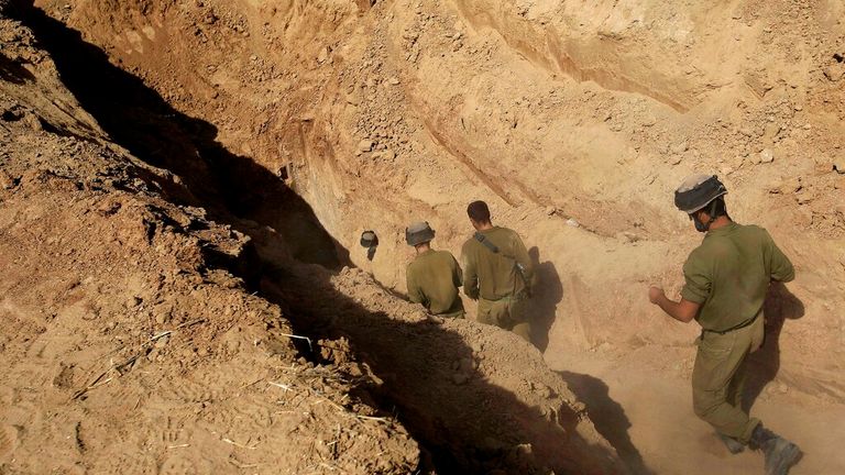 Israeli soldiers entering a tunnel near the Gaza border File Pic: AP 