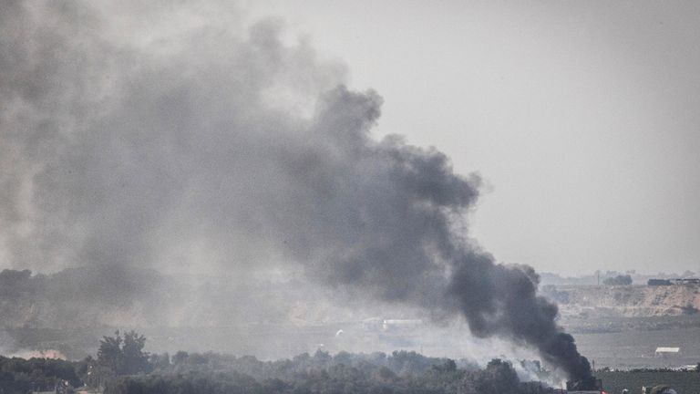 View of Gaza showing smoke rise from an explosion during Israeli bombardment. Pic: AP