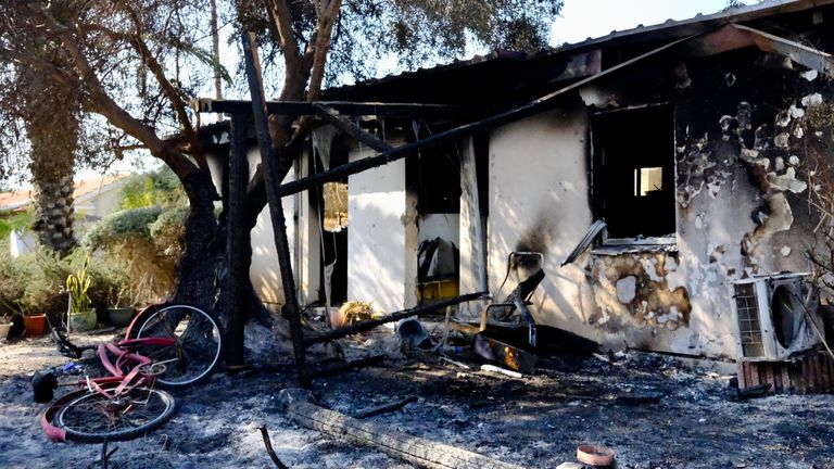 A burnt-out house in Kibbutz Re&#39;im