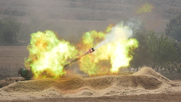 Israeli howitzer fires at the Gaza Strip. Pic: AP