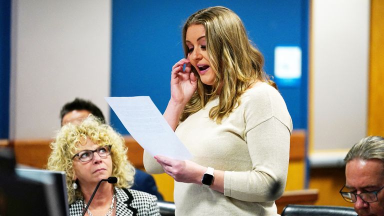 Jenna Ellis reads a statement after she pledguilty to a felony count of aiding and abetting false statements and writings