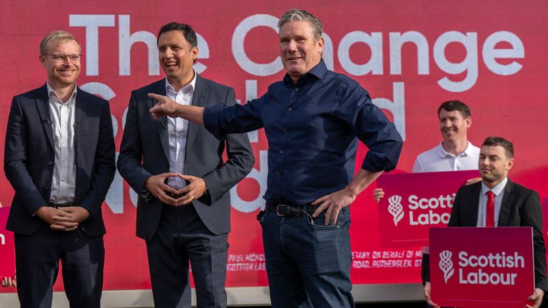 Labour leader Sir Keir Starmer with Scottish Labour leader Anas Sarwar (centre) and the new Labour MP for Rutherglen and Hamilton West Michael Shanks (left) at a rally following Scottish Labour&#39;s win in Rutherglen and Hamilton West by-election. Picture date: Friday October 6, 2023.