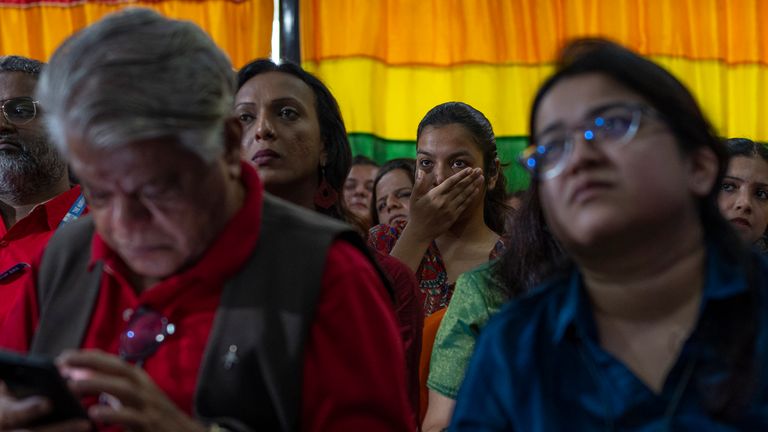 LGBTQ community supporters and members react as they watch the Supreme Court verdict on petitions that seek the legalization of same-sex marriage, in Mumbai, India, Tuesday, Oct. 17, 2023. According to a Pew survey, acceptance of homosexuality in India increased by 22 percentage points to 37% between 2013 and 2019. (AP Photo/Rafiq Maqbool)