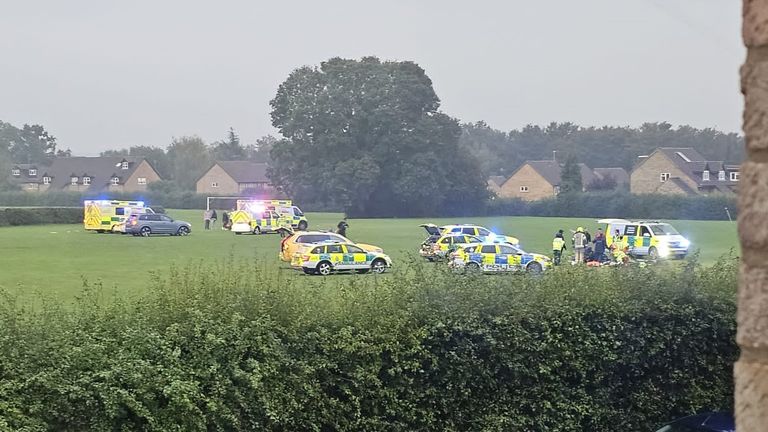 Police and paramedics at the scene after a boy and man were struck by lightning during a football tournament at The Sele School in Hertford, Pic: @taylerCorkett