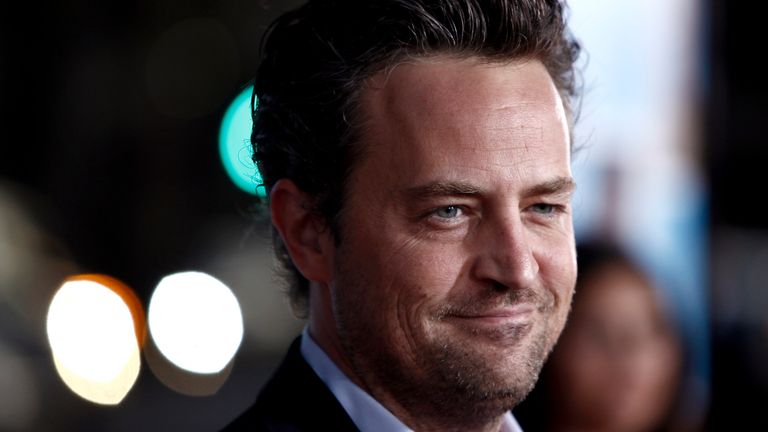 FILE - Matthew Perry arrives at the premiere of "The Invention of Lying" in Los Angeles on Monday, Sept. 21, 2009. Perry, who starred as Chandler Bing in the hit series ...Friends,... has died. He was 54. The Emmy-nominated actor was found dead of an apparent drowning at his Los Angeles home on Saturday, according to the Los Angeles Times and celebrity website TMZ, which was the first to report the news. Both outlets cited unnamed sources confirming Perry...s death. His publicists and other representatives did not immediately return messages seeking comment. (AP Photo/Matt Sayles, File)