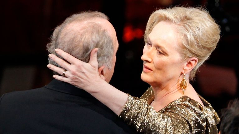 Meryl Streep, winner of the Oscar for best actress for her role in "The Iron Lady" hugs her husband, Don Gummer at the 84th Academy Awards in Hollywood, California, February 26, 2012. REUTERS/Gary Hershorn (UNITED STATES) (OSCARS-SHOW)