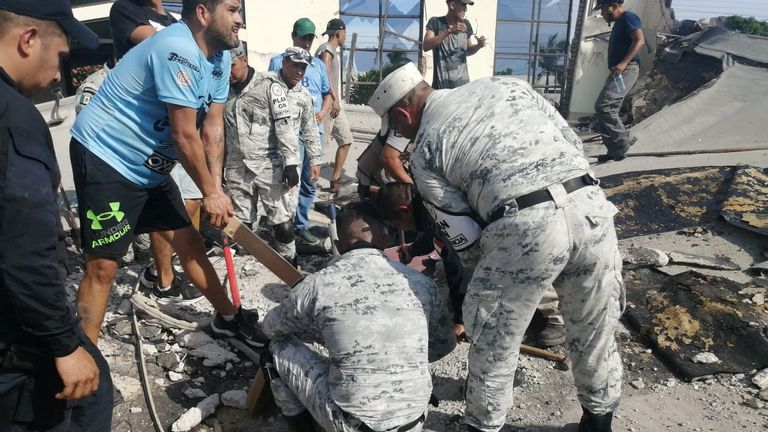 Rescuers have been digging through the night for survivors. Pic: Mexico Presidency via Reuters