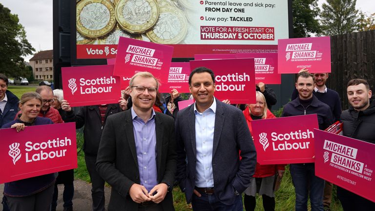 Scottish Labour leader Anas Sarwar and Scottish Labour candidate for Rutherglen and Hamilton West Michael Shanks unveil a billboard on their party&#39;s plan to make work pay in Cambuslang. Picture date: Friday September 22, 2023.