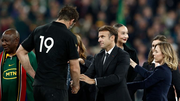 Rugby Union - Rugby World Cup 2023 - Final - New Zealand v South Africa - Stade de France, Saint-Denis, France - October 28, 2023 French President Emmanuel Macron presents New Zealand&#39;s Sam Whitelock with his runners up medal after the match REUTERS/Benoit Tessier
