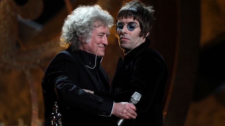 Liam Gallagher (right) on stage with Noddy Holder to collect the award for &#39;BRIT&#39;s Album of 30 Years&#39; won by Oasis during the BRIT Awards 2010, at Earls Court, London.