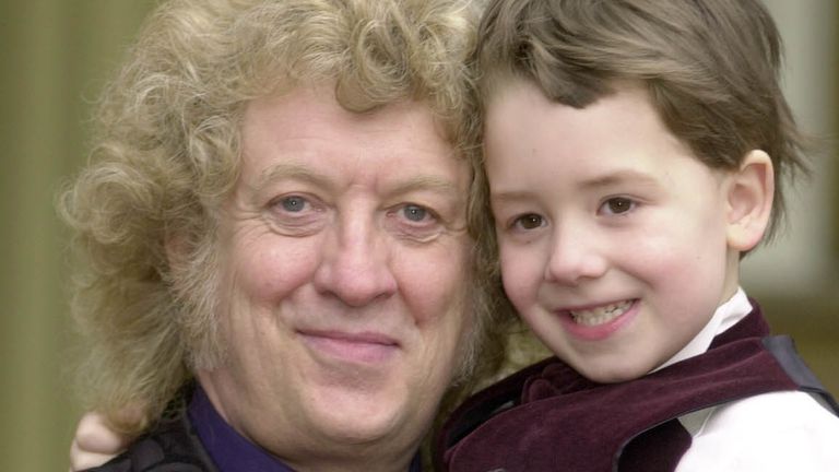 Musician Neville (Noddy) Holder from the band Slade with his son Django, age 5, received a MBE from the Prince of Wales during an Investiture ceremony held at Buckingham Palace.