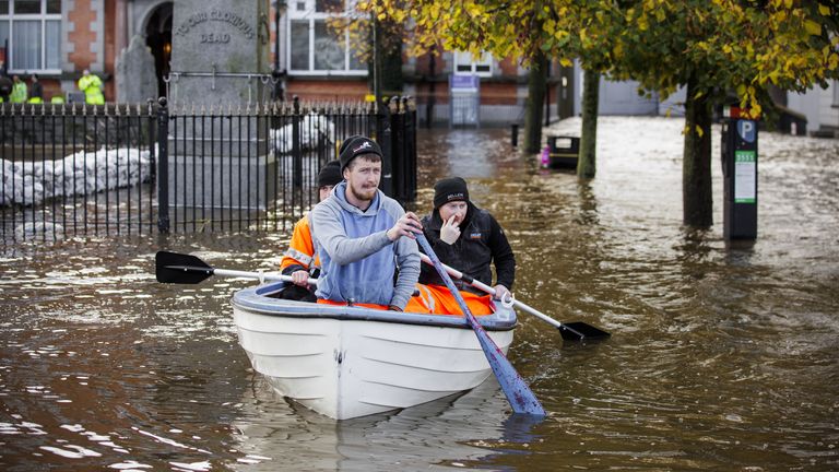 People canoe down a flooded Bank Parade in Newry Town, Co Down. Flooding was reported in parts of Northern Ireland, with police cautioning people against travelling due to an amber rain warning. The Met Office warning for Northern Ireland is the second highest level and covers Counties Antrim, Down and Armagh. Picture date: Tuesday October 31, 2023.