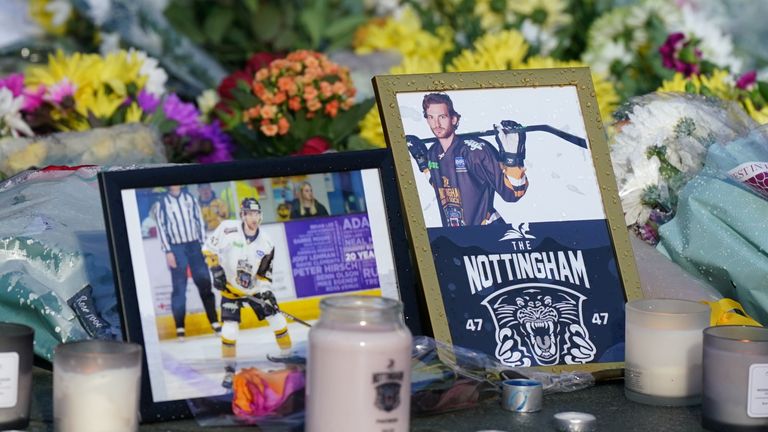 Lit candles among the flowers and messages left in tribute to Nottingham Panthers&#39; ice hockey player Adam Johnson outside the Motorpoint Arena in Nottingham, the home of the Panthers. Mr Johnson died after an accident during a Challenge Cup match with Sheffield Steelers on Saturday night. Picture date: Monday October 30, 2023.