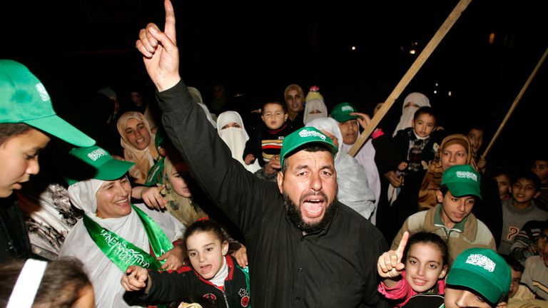 Palestinian supporters of Hamas celebrate the results of the Palestinian election in Gaza Strip January 26, 2006. Palestinian Prime Minister Ahmed Qurie resigned on Thursday after the Islamic militant group Hamas claimed victory over his ruling Fatah party in a parliamentary election, a senior official said. REUTERS/Mohammed Salem
