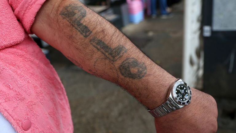 9 - A man shows off his Palestine Liberation Organization (PLO) tattoo on a day when Jewish institutions are on higher alert after a former Hamas leader called for an international "Day of Jihad" amidst ongoing violence in Israel, so fair claiming the lives of thousands on both Israeli and Palestinian sides in the previous week, in the Neukölln district of Berlin, Germany, on October 13, 2023. Photographer: Adam Berry