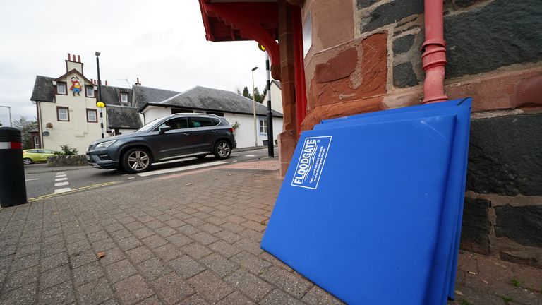 Flood prevention measures sit against a wall in the main street in Aberfoyle in Perthshire. Aberfoyle was hit with flooding a couple of weeks ago as storm Babet will bring heavy rain to the UK this week, with extensive flooding expected in already-saturated parts of Scotland. The Met Office has upgraded a weather warning for rain in eastern Scotland to amber, as some areas could see more than a month&#39;s worth of rain in a few days. Picture date: Wednesday October 18, 2023.