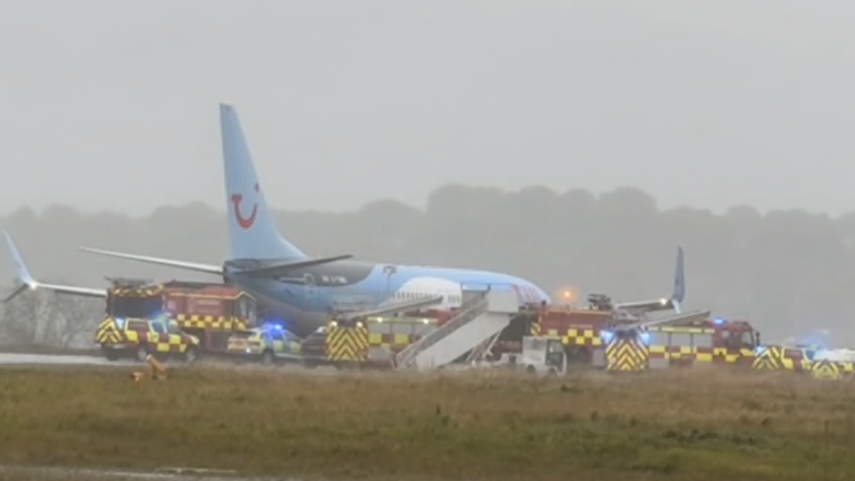 A plane has skidded off the runway at Leeds Bradford Airport while landing in heavy rain.