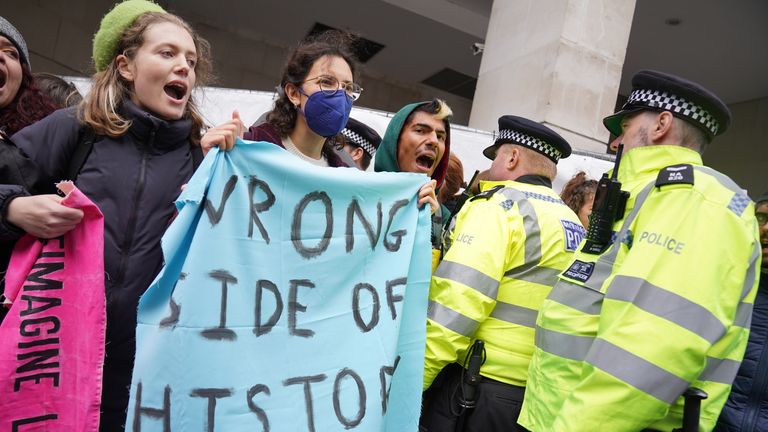 Activists from Fossil Free London outside the InterContinental in central London, demonstrate ahead of the Energy Intelligence Forum, a gathering between Shell, Total, Equinor, Saudi Aramco, and other oil giants