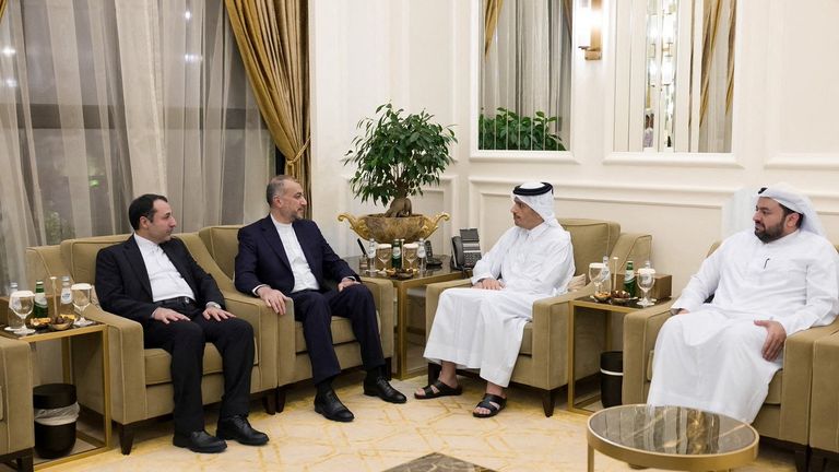 Qatar&#39;s Prime Minister and Foreign Minister Mohammed bin Abdulrahman Al Thani meets with Iranian Foreign Minister Hossein Amirabdollahian in Doha, Qatar, October 14, 2023. Qatar News Agency/Handout via REUTERS ATTENTION EDITORS - THIS PICTURE WAS PROVIDED BY A THIRD PARTY