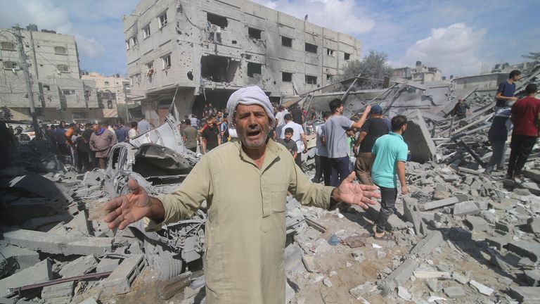 Palestinians look for survivors of the Israeli bombardment of Rafah. Pic: AP