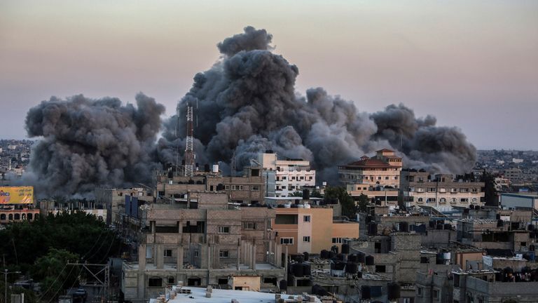 Smoke billows from buildings in Rafah after Israel airstrikes. Pic: AP