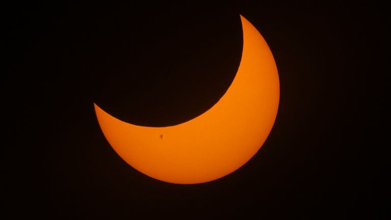 A partial solar eclipse is seen at the Griffith Observatory to watch the solar eclipse in Los Angeles Saturday, Oct. 14, 2023. (Ringo Chiu via AP)