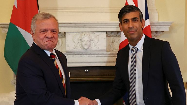 Prime Minister Rishi Sunak shakes hands with King Abdullah II