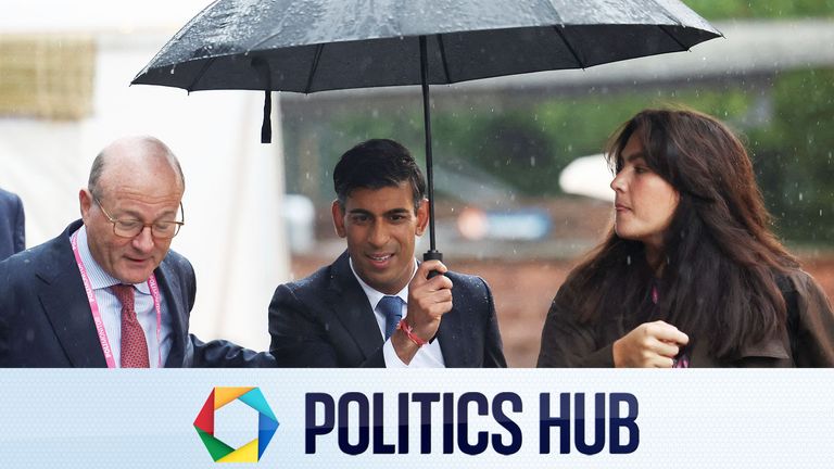 Rishi Sunak walks in the rain at the Conservative Party&#39;s annual conference in Manchester 