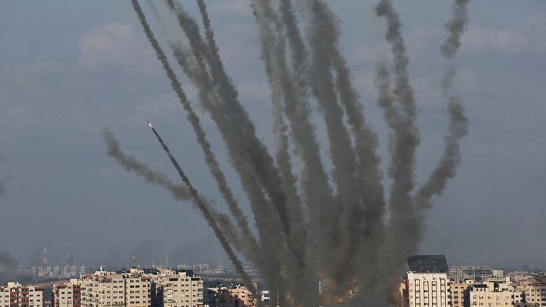 Rockets are fired from Gaza towards Israel, in Gaza, October 10, 2023. REUTERS/Mohammed Salem
