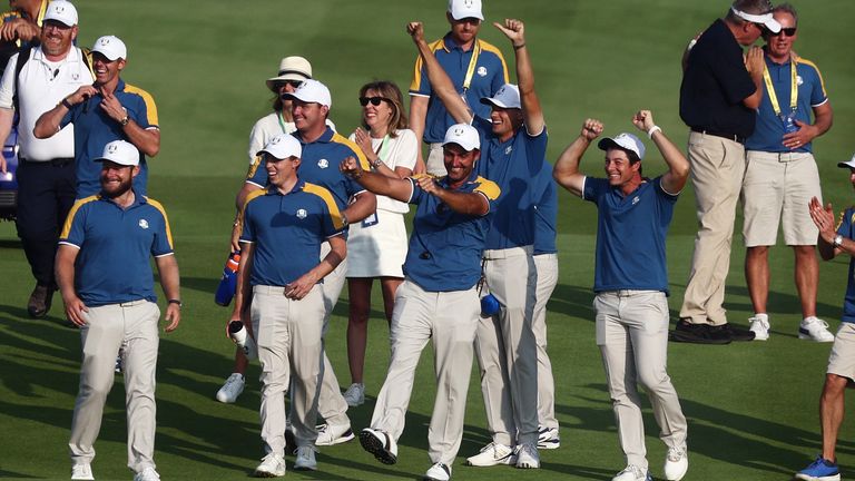Team Europe players celebrate on the 18th hole after their Ryder Cup victory in Rome
