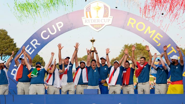 The voctorious Europe team lift the Ryder Cup. Pic: AP