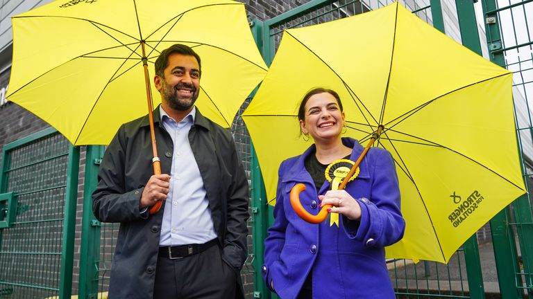 SNP leader Humza Yousaf and SNP candidate Katy Loudon outside the polling station at St Charles&#39; primary school, Cambuslang, during the Rutherglen and Hamilton West by-election. Picture date: Thursday October 5, 2023.