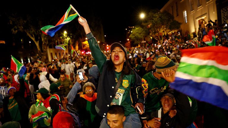Rugby Union - Rugby World Cup 2023 - Final - South Africa fans watch New Zealand v South Africa - Cape Town, South Africa - October 28, 2023 Fans celebrate in Cape Town after South Africa win the world cup final REUTERS/Esa Alexander
