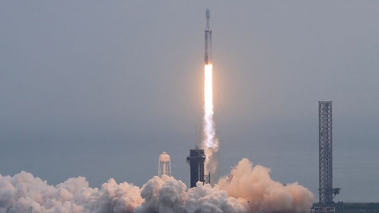 A SpaceX Falcon Heavy rocket lifts off carrying a NASA spacecraft to investigate the Psyche asteroid from the Kennedy Space Center in Cape Canaveral, Florida, U.S., October 13, 2023. This is the first spacecraft to explore a metal-rich asteroid, which may be the leftover core of a protoplanet that began forming in the early solar system more than 4 billion years ago. REUTERS/Joe Skipper
