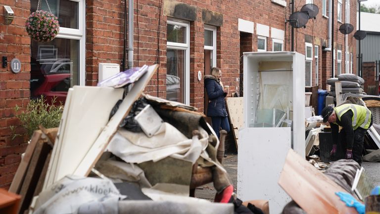 Property outside flooded homes on another street in Chesterfield, Derbyshire amid Storm Babet in 2023. Pic: PA