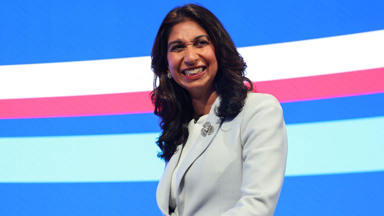 Suella Braverman reacts on stage at Britain&#39;s Conservative Party&#39;s annual conference in Manchester