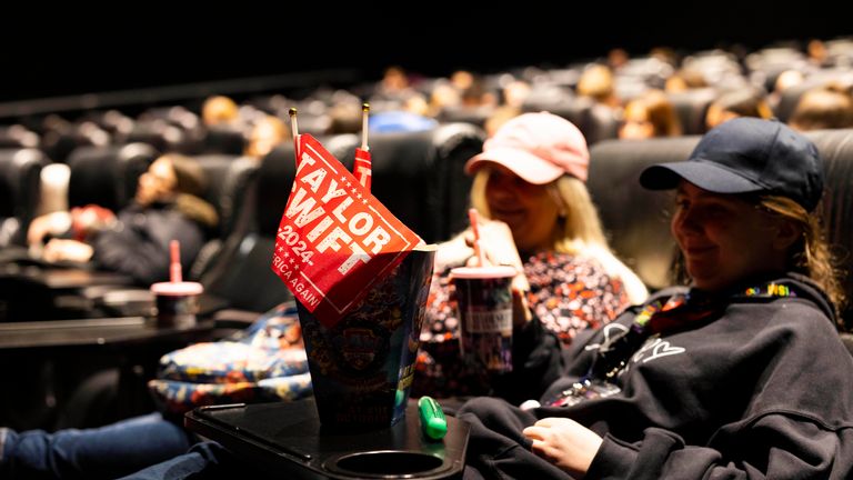 EDITORIAL USE ONLY Taylor Swift fans Katie Stewart and Sarah Stewart 21 from London at Vue West End in London&#39;s Leicester Square for a screening of Taylor Swift&#39;s most recent tour, The Eras Tour, on the big screen. Picture date: Friday October 13, 2023.