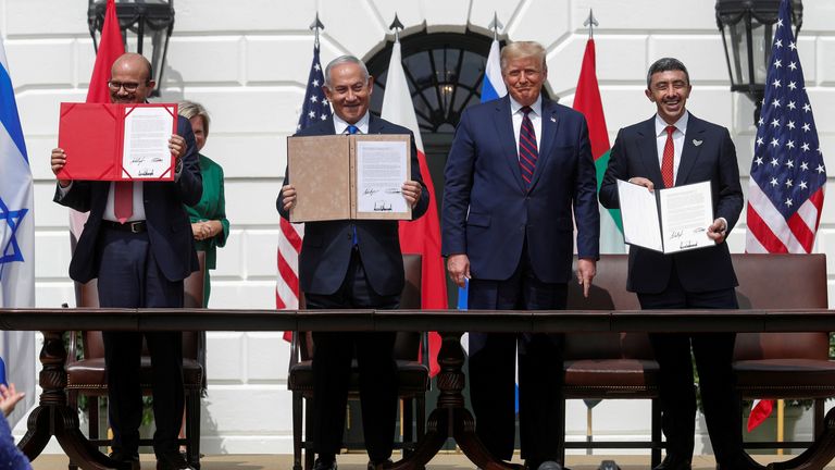 Leaders, including Israel&#39;s Benjamin Netanyahu (second left) join Donald Trump to sign the Abraham Accords in 2020