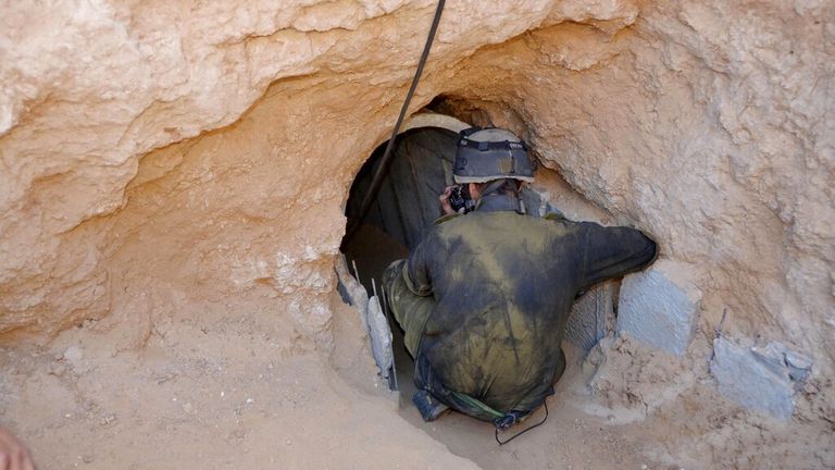 An Israeli soldier at the mouth of an underground tunnel leading to the southern part of Gaza File pic: AP 