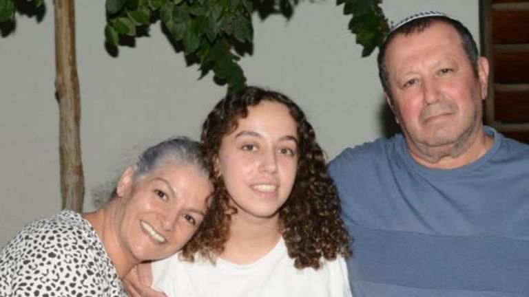 Private Uri Magidish pictured with her family after she was released during a ground operation. Pic: IDF