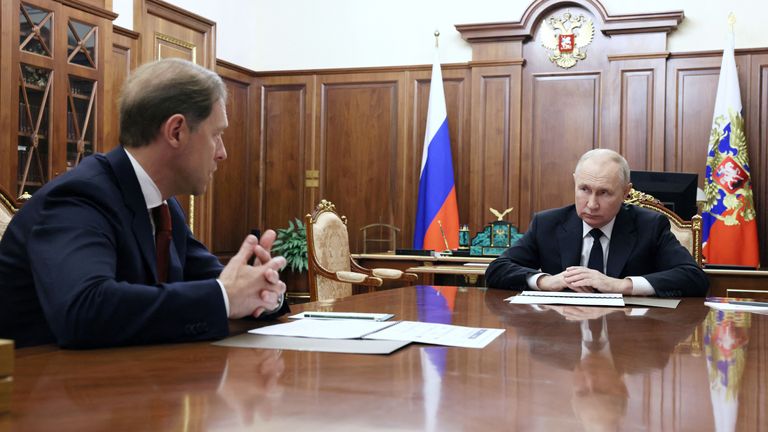Vladimir Putin listens to Deputy Prime Minister and Minister of Industry and Trade Denis Manturov during a meeting at the Kremlin in Moscow
Pic:Sputnik/Ruters