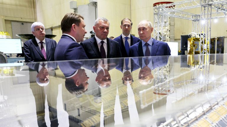 Russian President Vladimir Putin, Russian Deputy Prime Minister and Minister of Industry and Trade Denis Manturov, Head of Russian state space corporation Roscosmos Yuri Borisov visit the centre of the Rocket and Space Corporation "Energia" in Korolyov outside Moscow, Russia, October 26, 2023. Sputnik/Gavriil Grigorov/Pool via REUTERS ATTENTION EDITORS - THIS IMAGE WAS PROVIDED BY A THIRD PARTY.