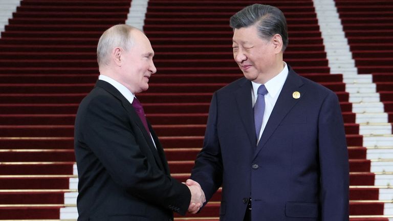 Russian President Vladimir Putin is welcomed by Chinese President Xi Jinping during a ceremony at the Belt and Road Forum in Beijing, China, October 17, 2023. Sputnik/Sergei Savostyanov/Pool via REUTERS ATTENTION EDITORS - THIS IMAGE WAS PROVIDED BY A THIRD PARTY.