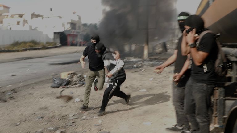 Still from Stuart Ramsay report from the West Bank October 20 2023. A protester is shot