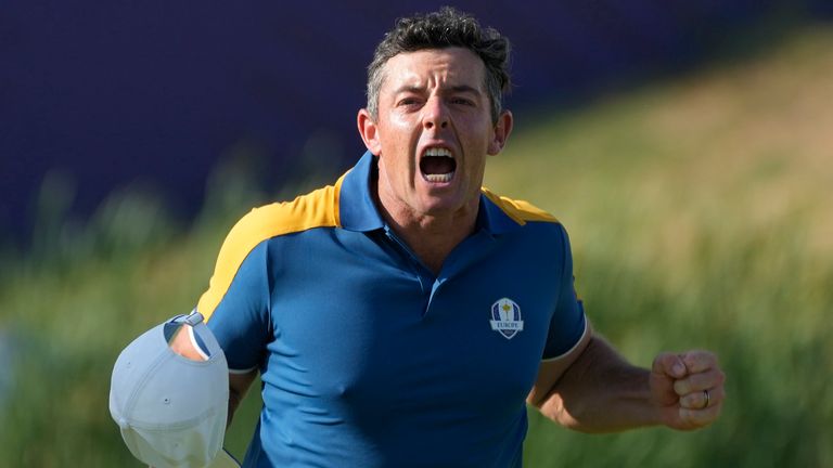 Europe&#39;s Rory McIlroy celebrates after winning his singles match against United States&#39; Sam Burns 3&1 on the 17th green at the Ryder Cup golf tournament at the Marco Simone Golf Club in Guidonia Montecelio, Italy, Sunday, Oct. 1, 2023. (AP Photo/Gregorio Borgia)