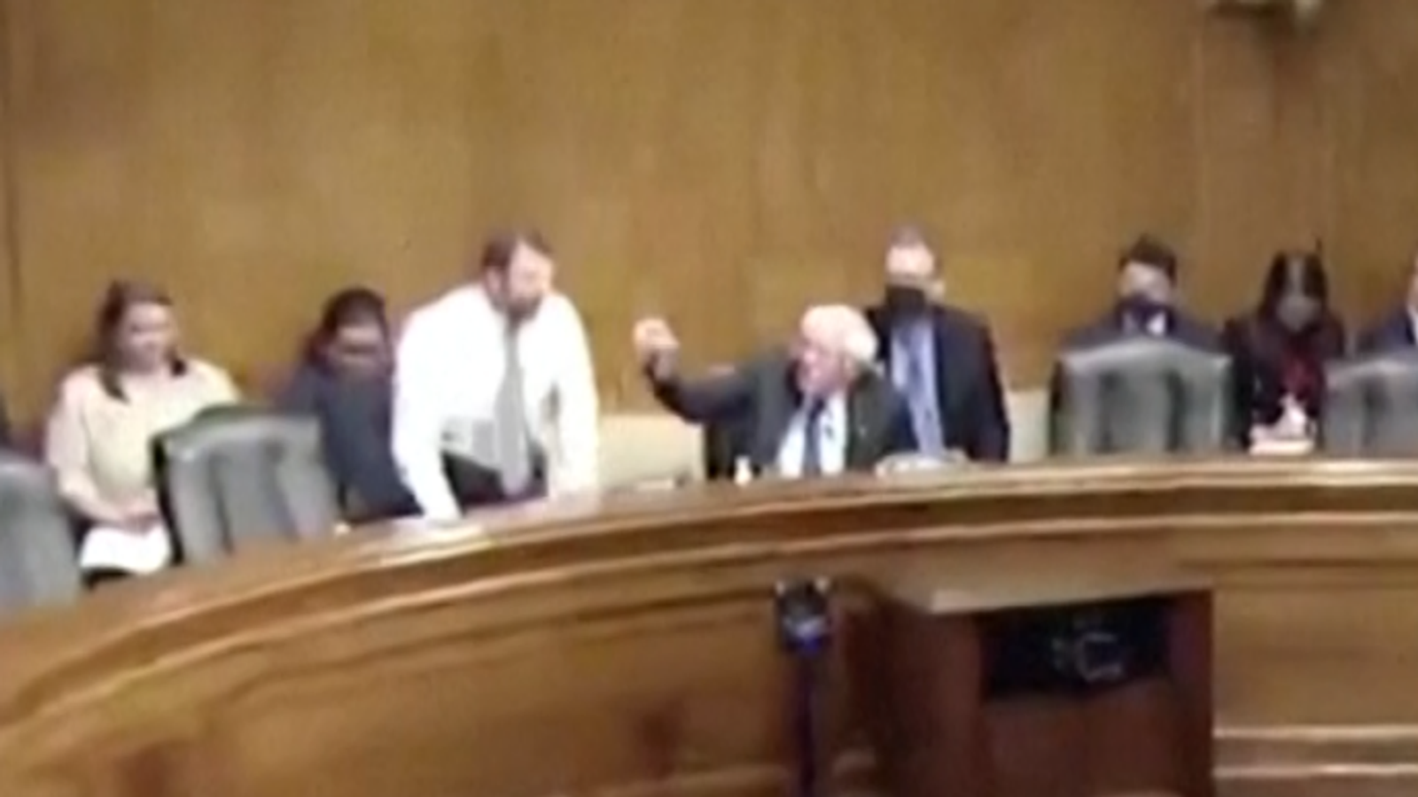 Bernie Sanders steps in to prevent fist fight during heated war of words at US Senate hearing